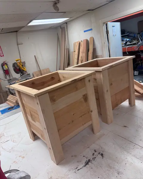 Pair of square cedar planters, angled view